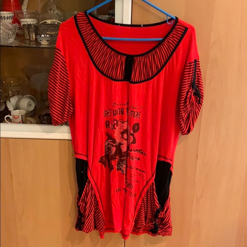 Float red top worn with leggings